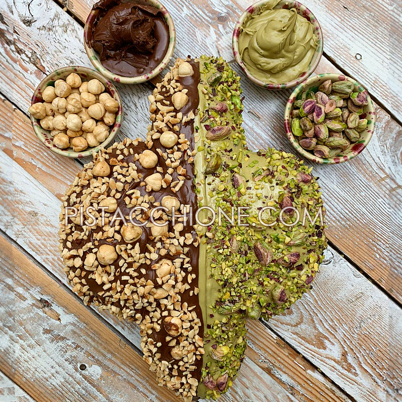 they are "COLOMBUONA" ½ GLAZED WITH PISTACHIO CREAM - WHOLE GRAINS AND PISTACHIOS - ½ GLAZED WITH MODICA CHOCOLATE - GRAINS AND TOASTED HAZELNUTS + EXTRA JAR